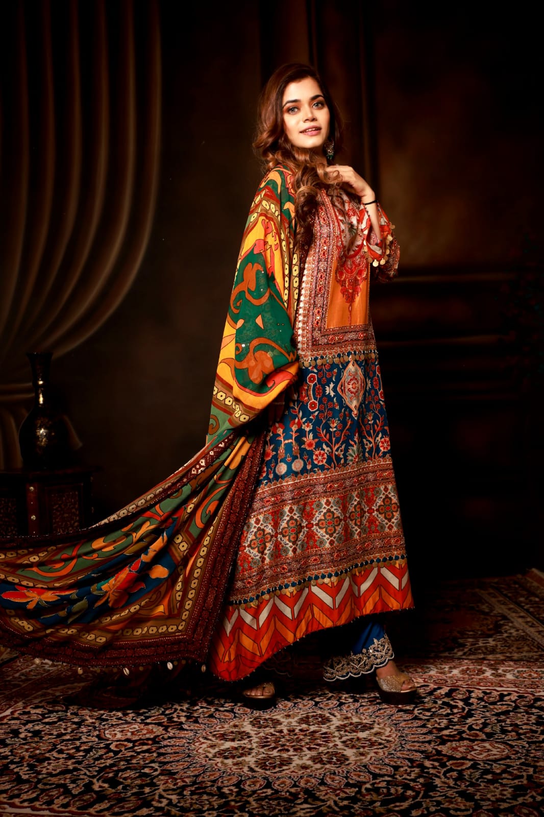 A line orang kurta & blue pant border with arabic Dupatta.