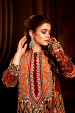 Wine color heavy neck front short back long kurta with coul pant.