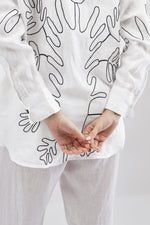 White Shirt with Abstract Pattern