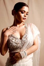 Cream pleated organza saree